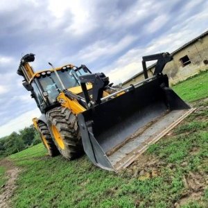 foto als neu JCB 4CX Piling Baggerlader mit bohre 14m