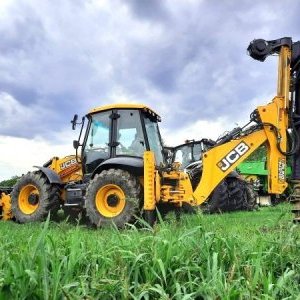 foto als neu JCB 4CX Piling Baggerlader mit bohre 14m